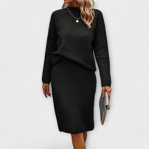 Complete with sweater and two-piece skirt